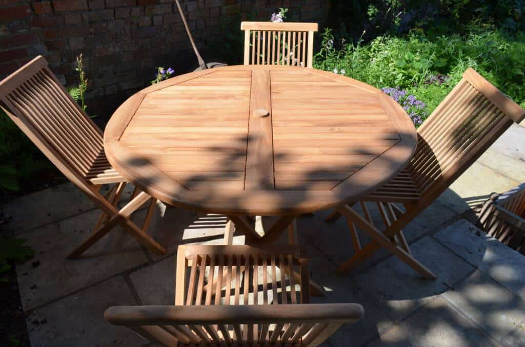 teak folding 1.m table and 4 teak folding chairs set